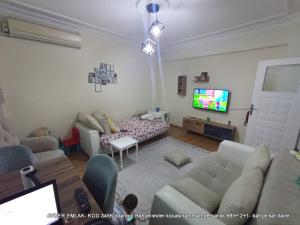istanbul Bahçelievler kocasinan mah de satılık 88m² 2+1- bahçe.kat daire